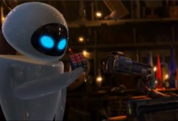 A white robot called EVE shows the solved Rubik's cube to WALL·E. WALL·E looks again very interested at the cube.